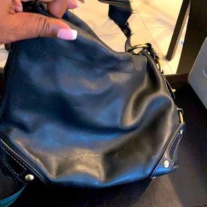 Black leather coach handbag